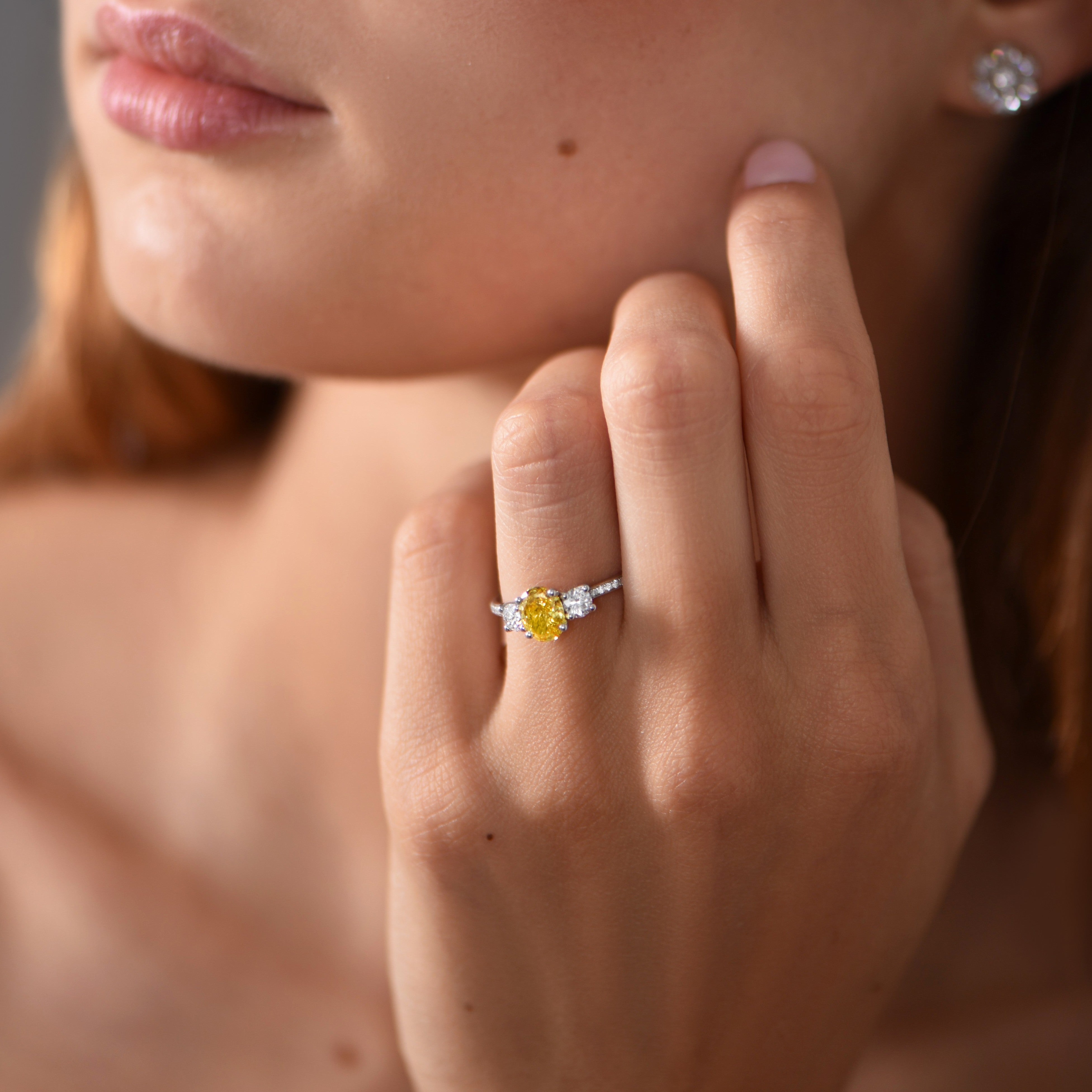 Trilogy ring with yellow diamond