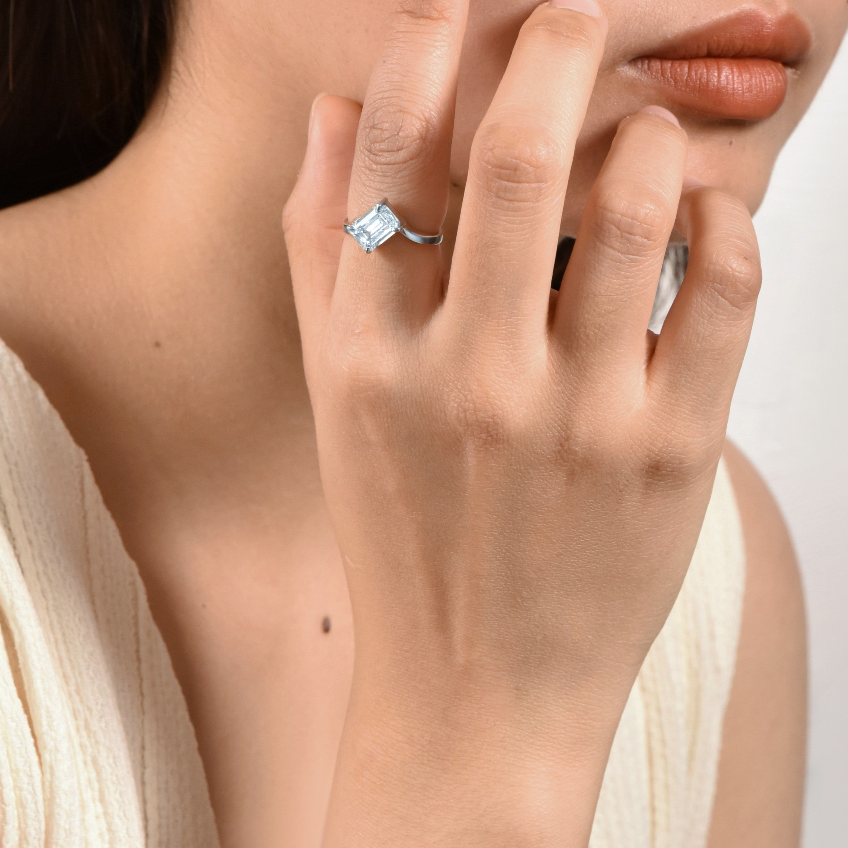 Ice Skating Girl emerald cut diamond ring