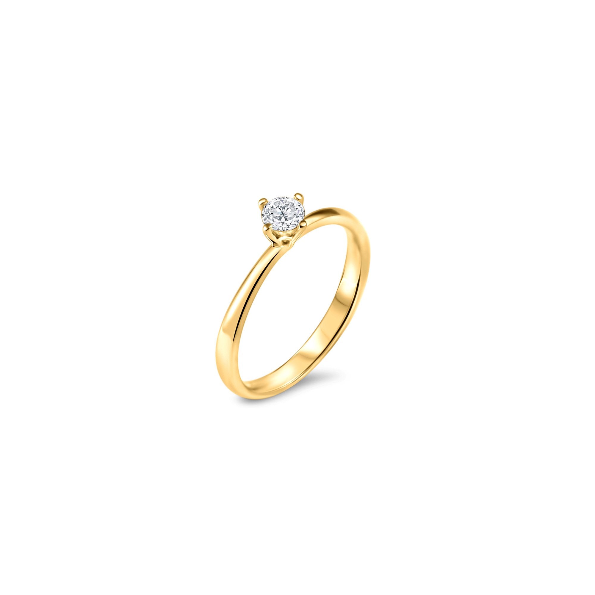Un délicat diamant taille brillant de 0.25-0.29ct est monté sur un anneau dont le corps se rétrécit au niveau de la pierre centrale. Le sertissage à 4 griffes de ce solitaire 