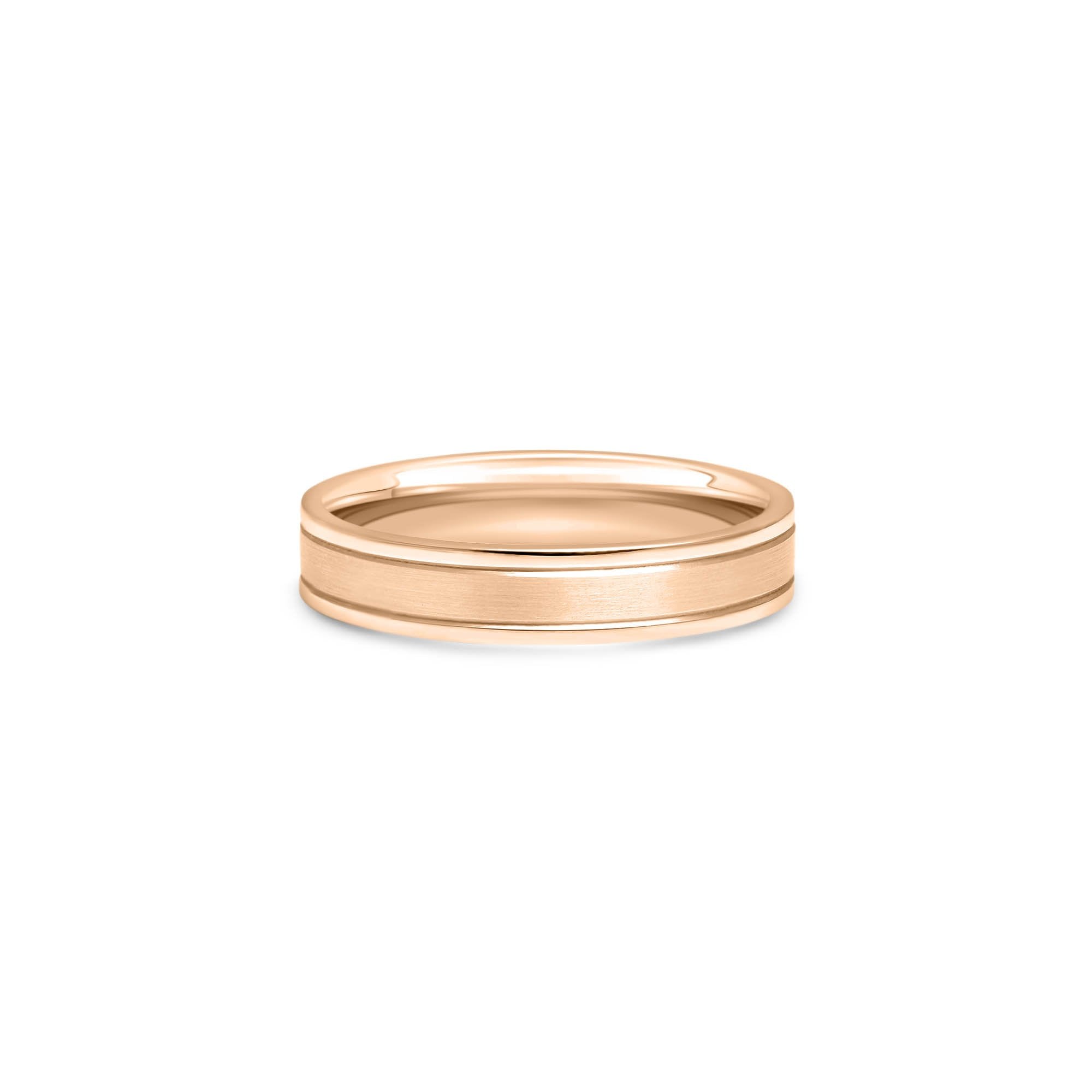 The Sea that Connects Us est une alliance avec des fins bords polis et une surface matte. Le profil de la bague est plat.