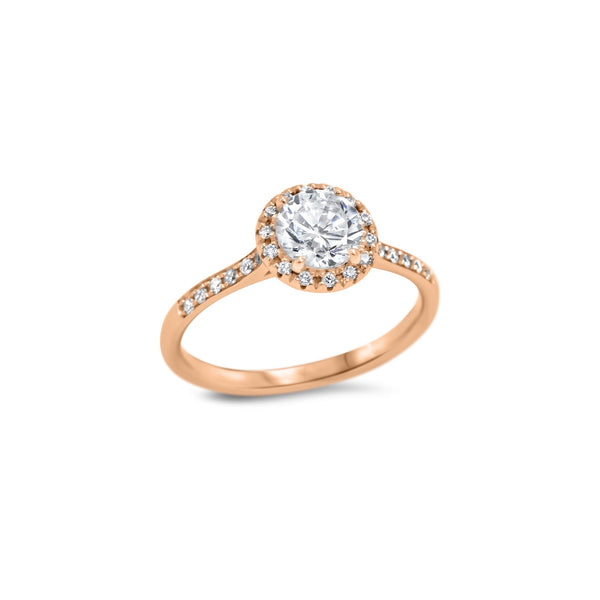 Solitaire avec un diamant de culture de 0.75ct entouré d'un magnifique halo de diamants et un sertissage en micropavé sur le pourtour de la bague.