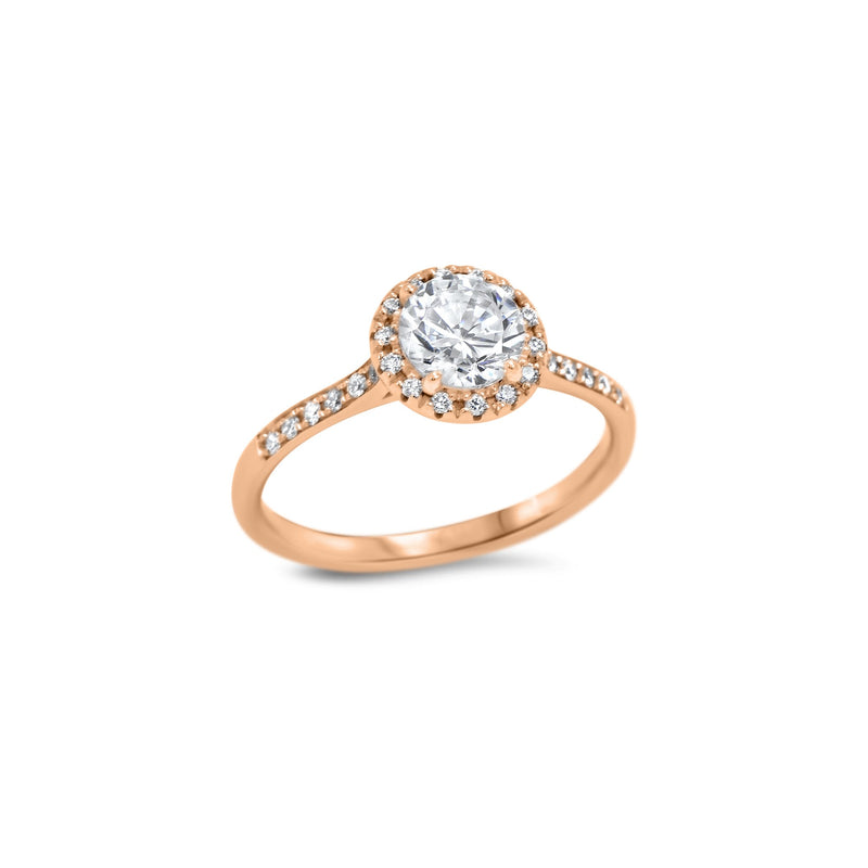 Solitaire avec un diamant de culture de 0.75ct entouré d'un magnifique halo de diamants et un sertissage en micropavé sur le pourtour de la bague.